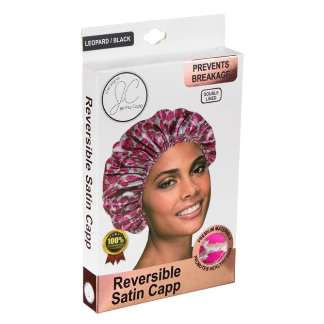 A box of a leopard print and black reversible satin hair cap is shown.